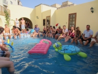 Students arround the pool